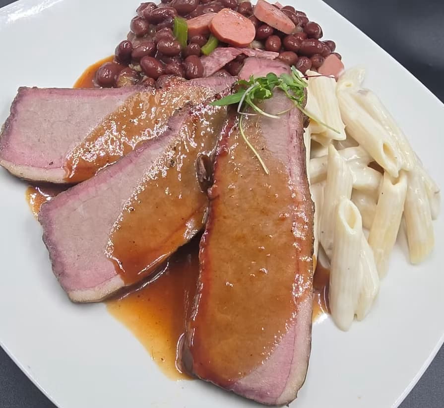 Smoked brisket dinner with pasta and beans