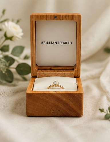 Wooden ring box styled for a wedding ceremony